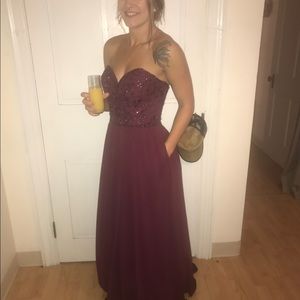 Size 2 maroon embellished bridesmaid dress. Worn once. Has been dry cleaned.